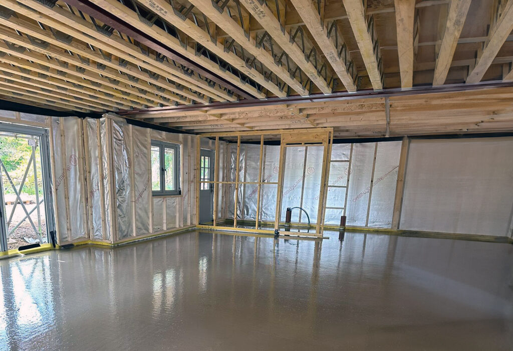 Screed floor freshly laid at a construction project, still wet